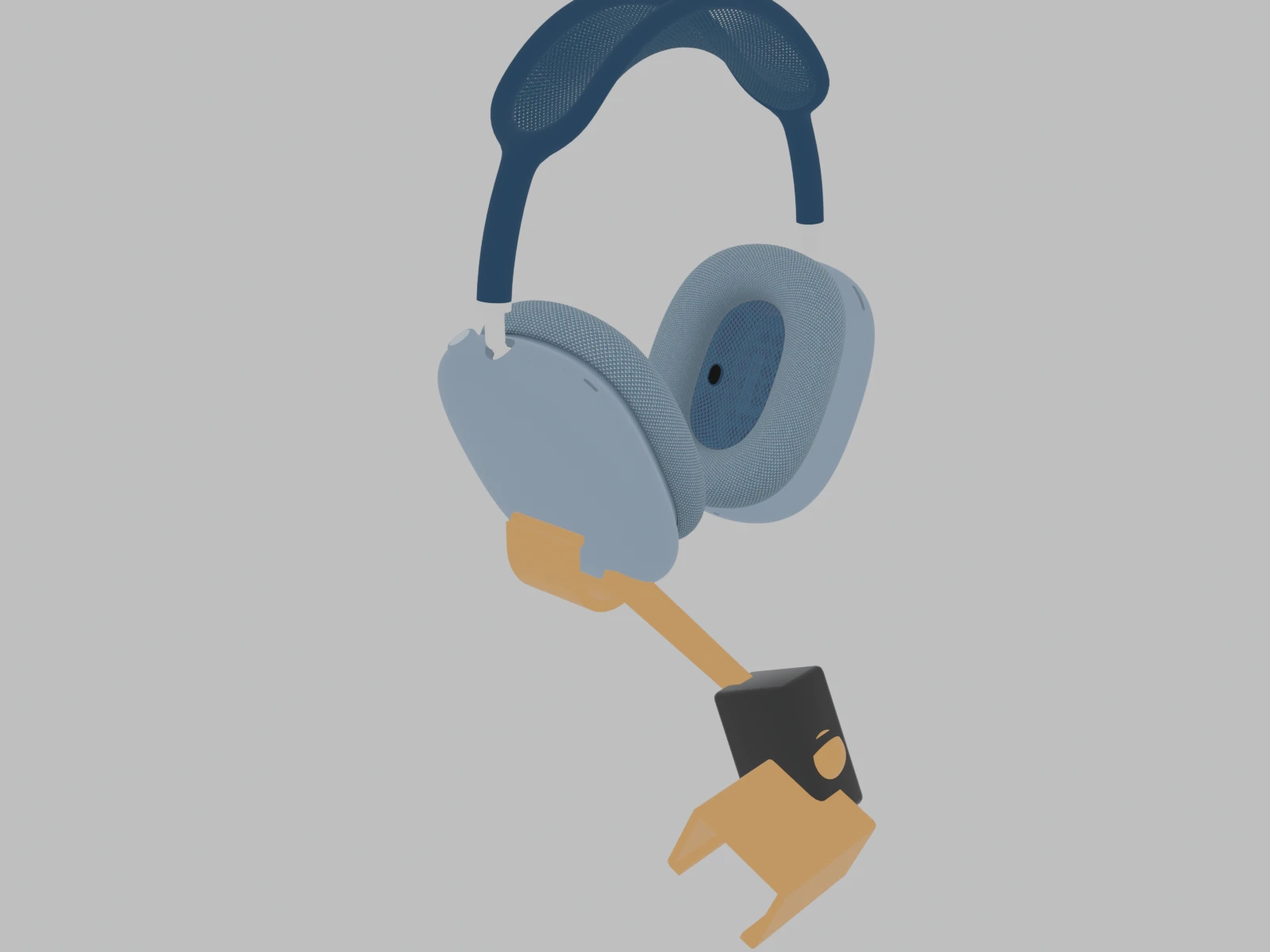 A render of the printed clip, in orange, clamped to the bottom of an AirPods Max ear cup, holding a black mic on a short boom, drawn against the scanned headphone mesh.